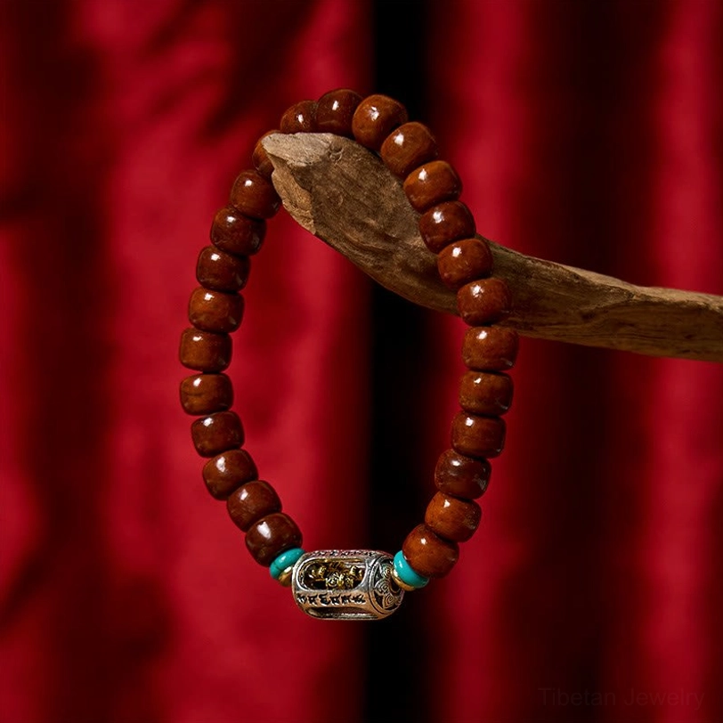 Tibetan Dzi bone bracelet with Vajra spiritual symbol and protective energy design
