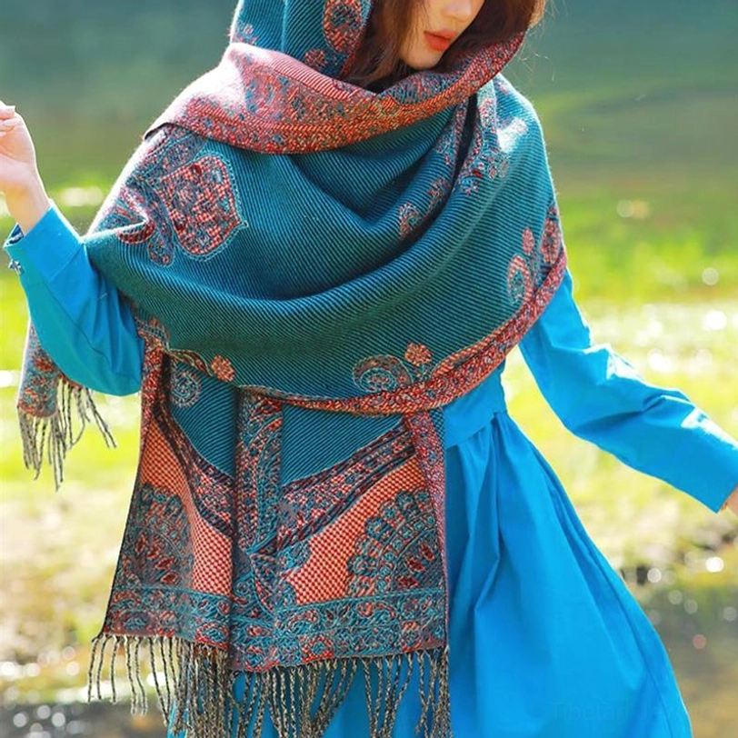 Tibetan paisley shawl worn as protective travel wrap