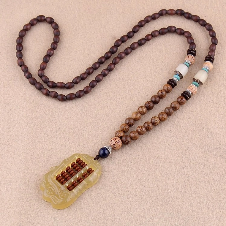 Handmade tibetan necklace with carved abacus-style wooden pendant and minimalist wenge wood spacer beads