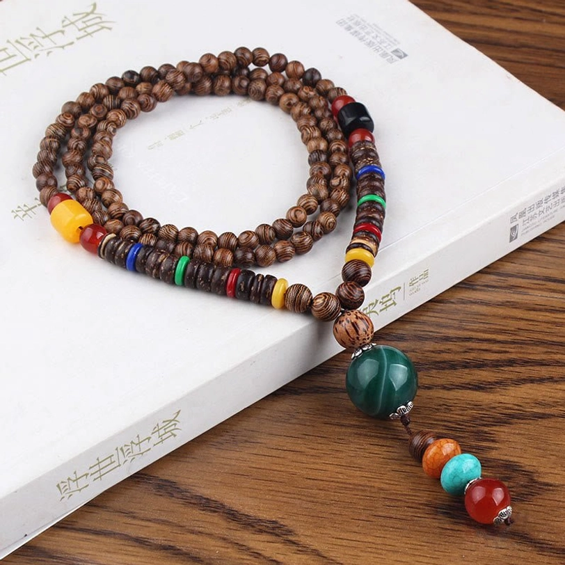 Tibetan wenge wood multi-loop necklace with green agate pendant, red and yellow bead accents