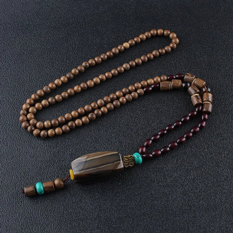Tibetan wenge wood necklace with random natural wooden bead pendant and ethnic spiritual accents
