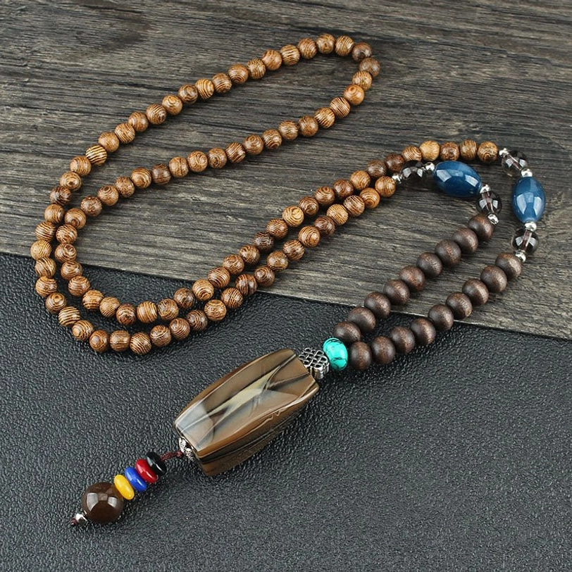 Handmade tibetan wenge wood and resin bead necklace with ethnic spacer ornaments and spiritual design