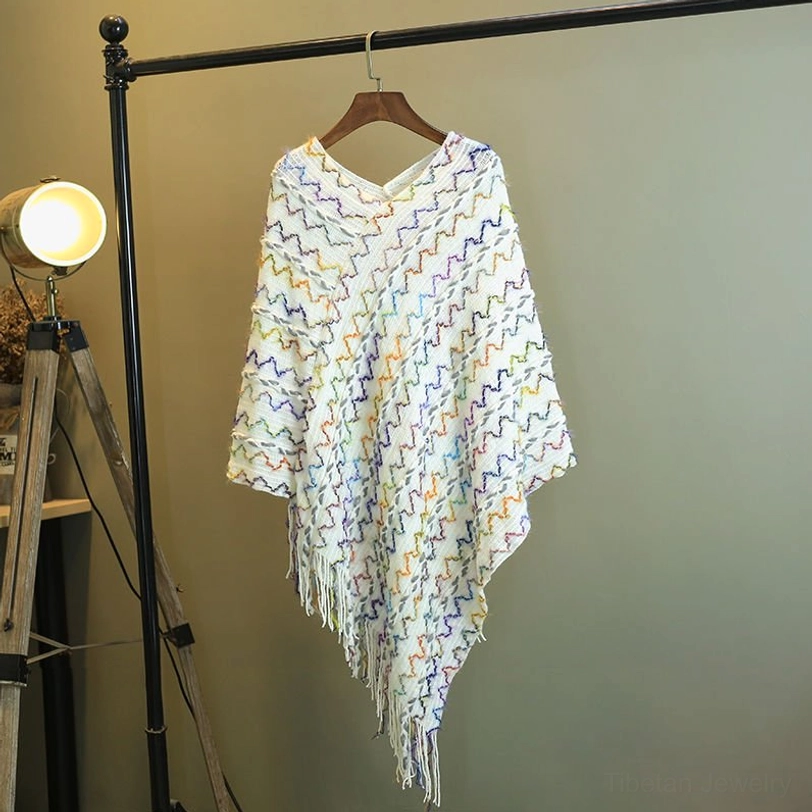 White tibetan striped tassel shawl with clean aesthetic and versatile styling potential