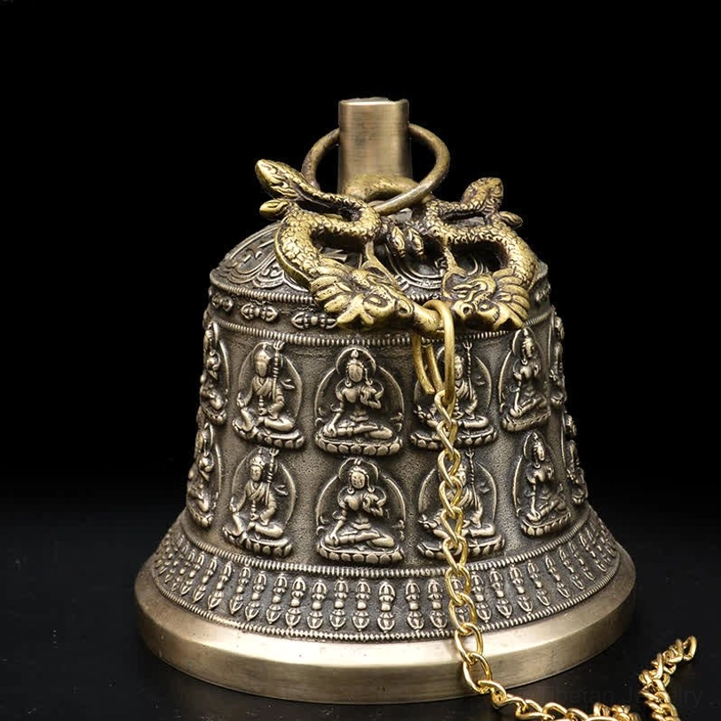 Handcrafted copper wind chime bell top view showing dual dragon suspension hook and hanging chain detail