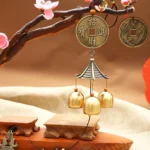 Tibetan copper wind chime with Zhao Cai Jin Bao bronze coin dragon charm and three brass bells hanging decoration feng shui prosperity