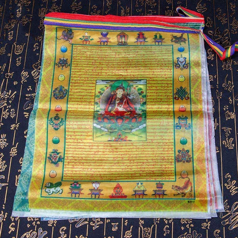 Single Tibetan prayer flag with Buddha portrait and five-color windhorse design on calligraphy fabric background