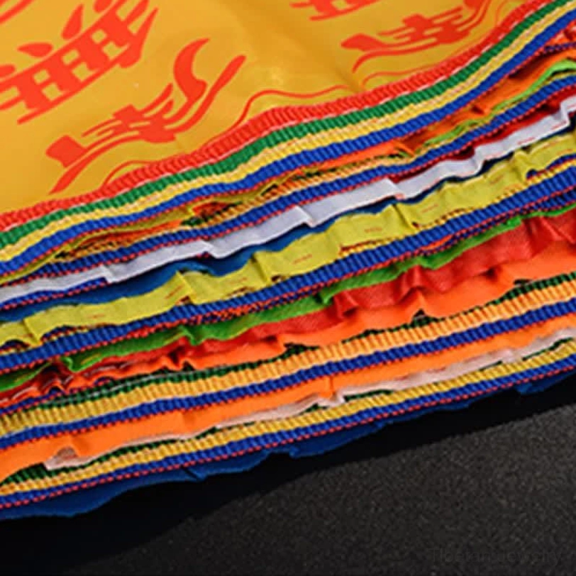 Tibetan Windhorse prayer flags full length display on plain background