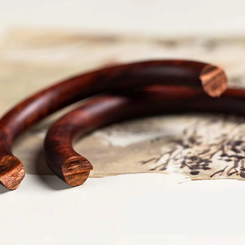 Tibetan sandalwood and ebony wood protection bracelet set showcasing different wood types in authentic colors