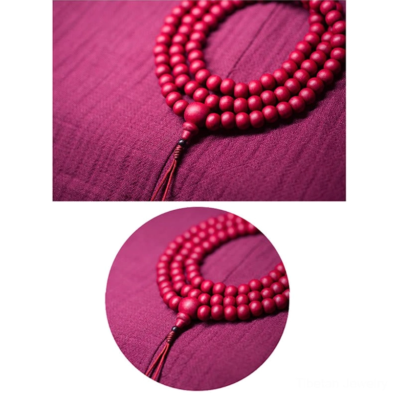 Abelia biflora prayer bead side profile displaying deep matte red color and authentic natural wood grain characteristic of dragon wood from wutai mountain