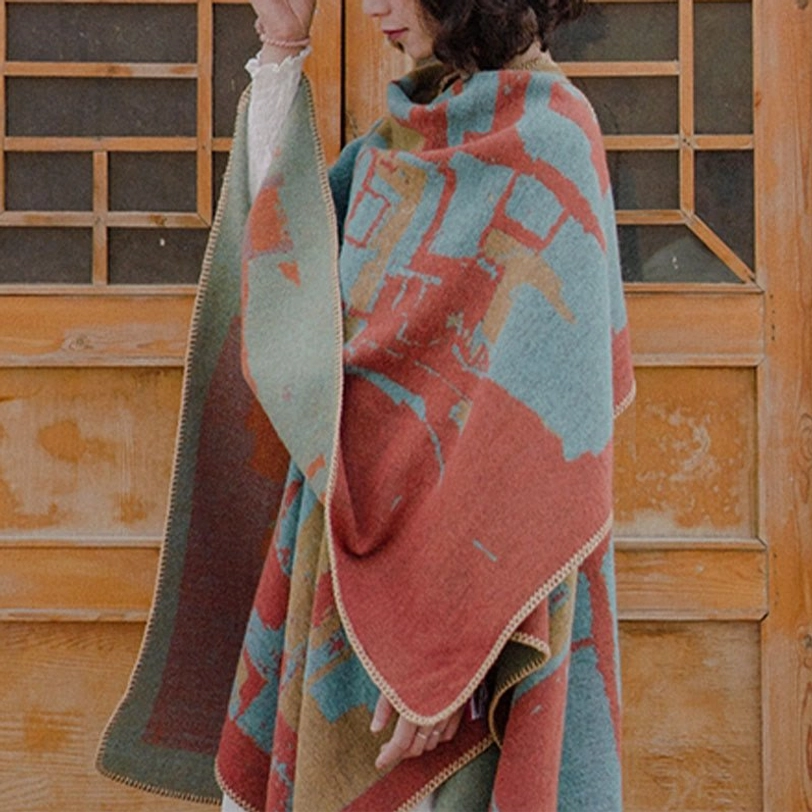 Thick woven Tibetan poncho shawl back half-body with contrast stitched trim details