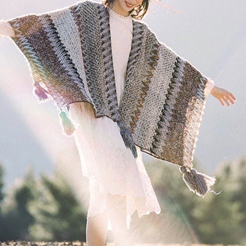Tibetan warm wrap shawl with hand-inspired striped weave used as meditation or yoga blanket indoors