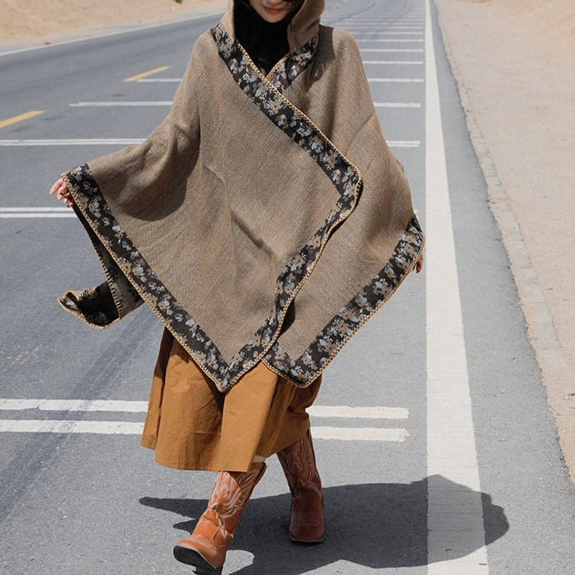 Tibetan wrap poncho care instructions and material composition showing eco-friendly natural fabric
