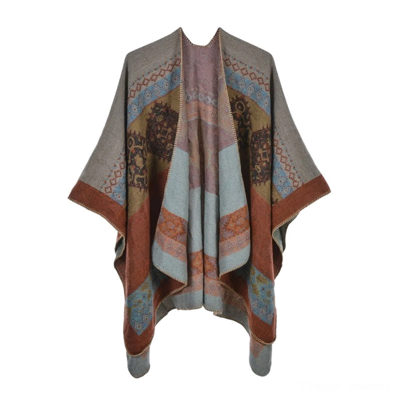 Winter wrap poncho three-quarter side front view with geometric collar trim and soft knitted fabric featuring fur hairband detail