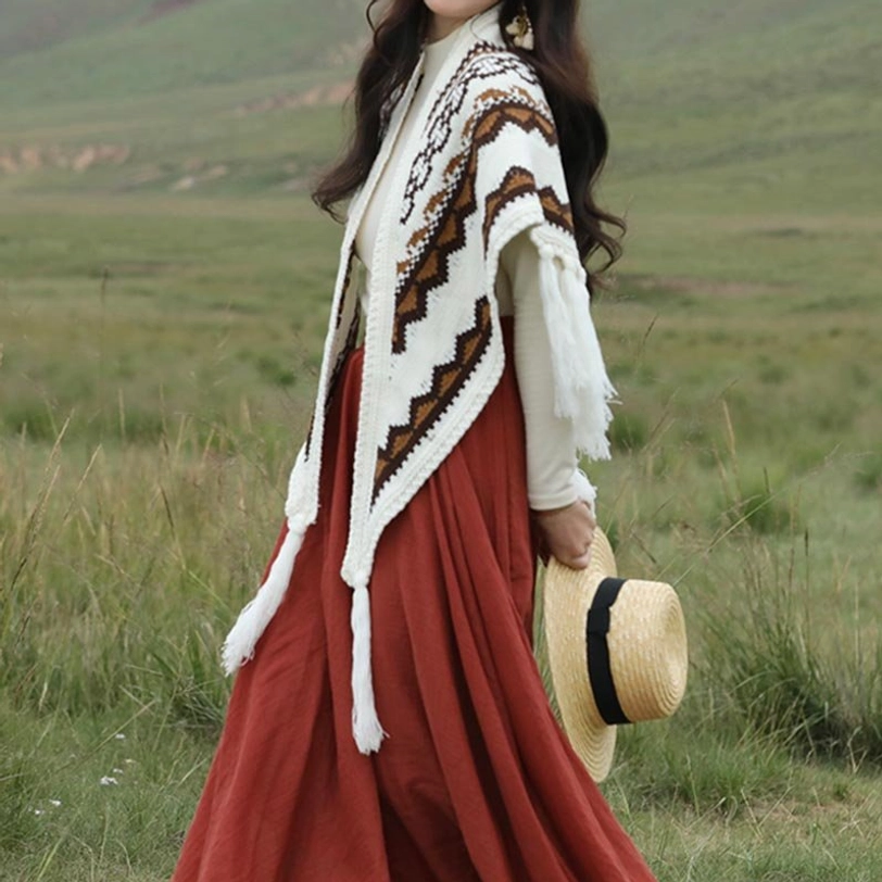 Side view of Tibetan triangular wrap shawl with front tie closure and hanging side tassels
