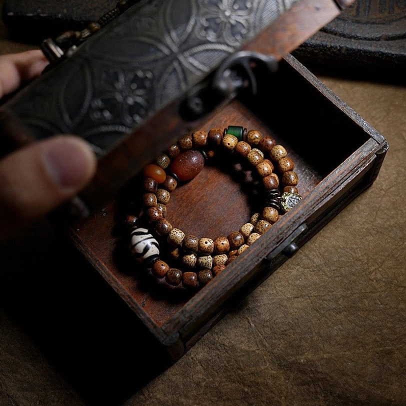 Tibetan Zakiram bodhi seed bracelet with dzi beads offering spiritual guidance and protection from misfortune