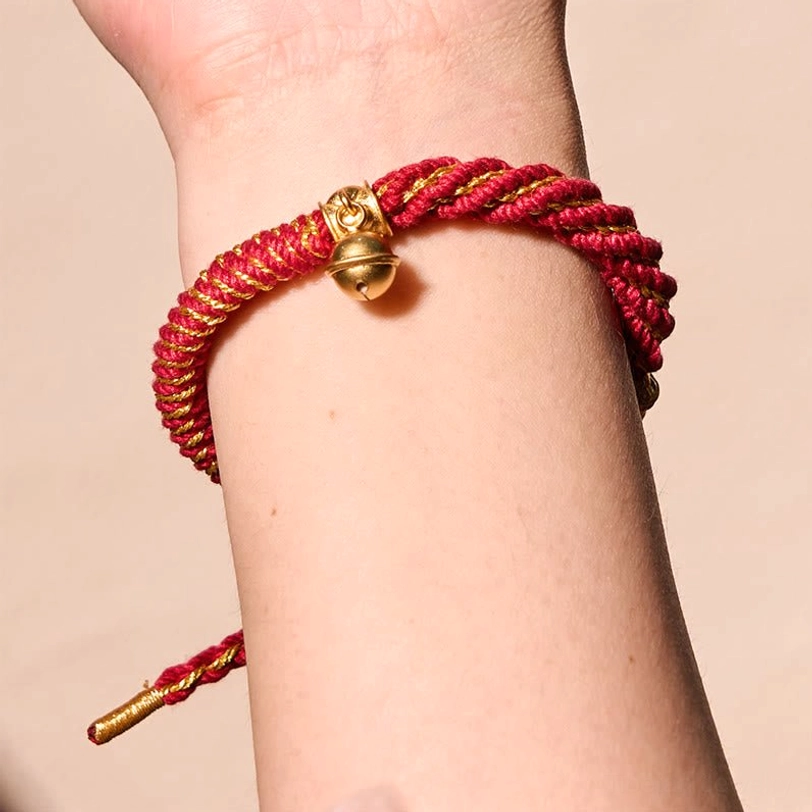 Tibetan Zakiram goddess protection bracelet with colorful woven design and traditional metal charms for daily blessing