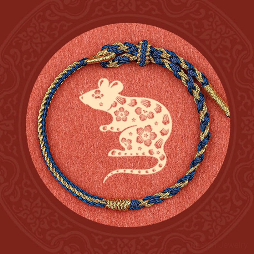 Dark blue Tibetan braided protection bracelet with traditional sacred knotwork design