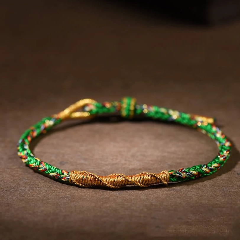 Green twisted Tibetan zodiac natal buddha braided bracelet with adjustable closure for harmony and balance