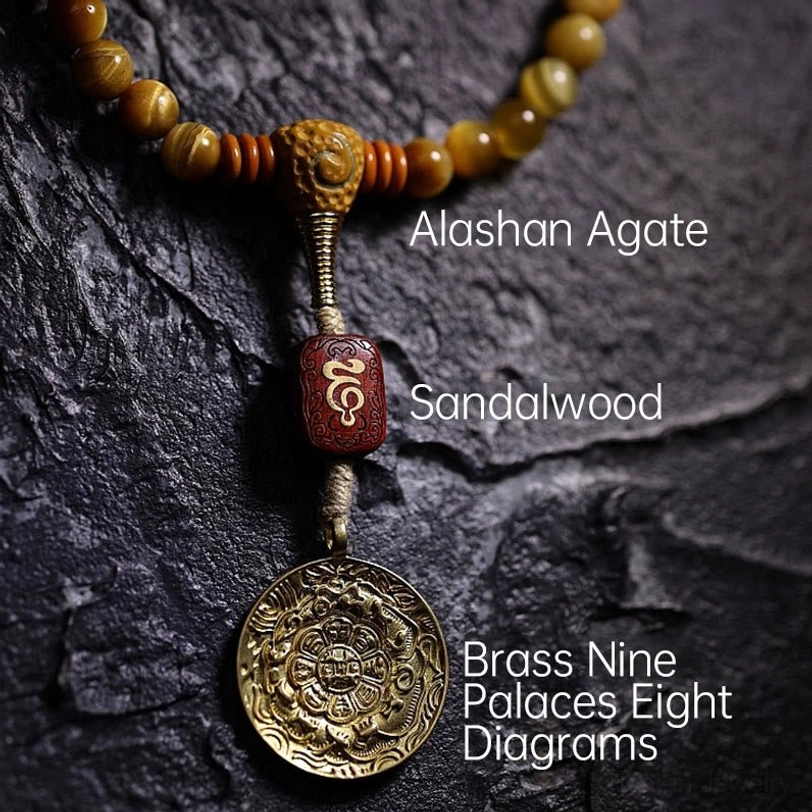 Tiger Eye mala 108 beads with golden chatoyant sheen and Tibetan Buddhist spiritual symbolism