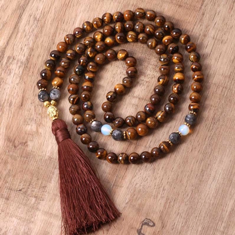 Coiled tiger eye mala necklace with blue accent beads and traditional tassel detail