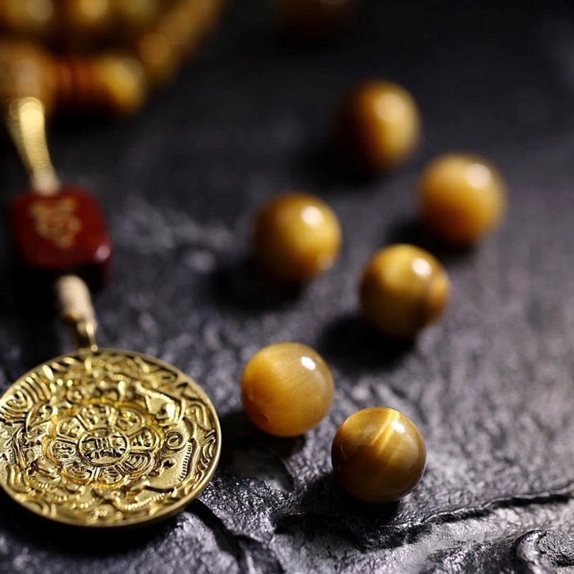 Handmade Tiger Eye mala with natural stone beads and authentic Vajra guru bead craftsmanship detail