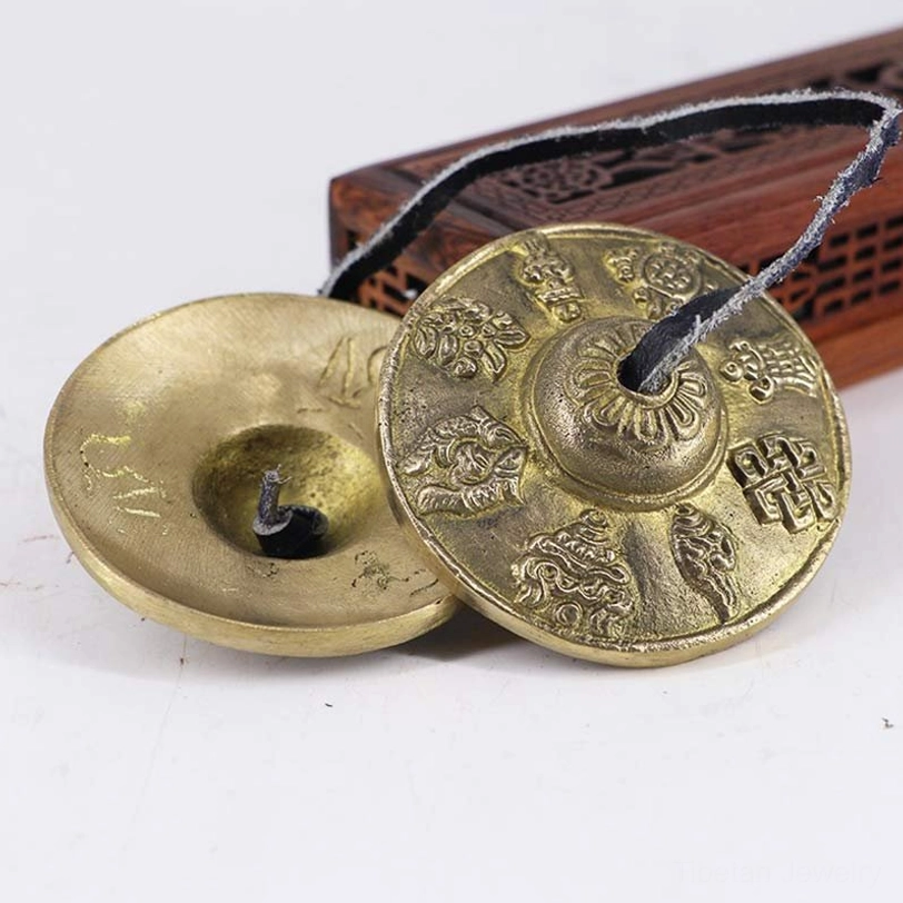 Tibetan tingsha sound healing bells for meditation and energy clearing with sacred mantras