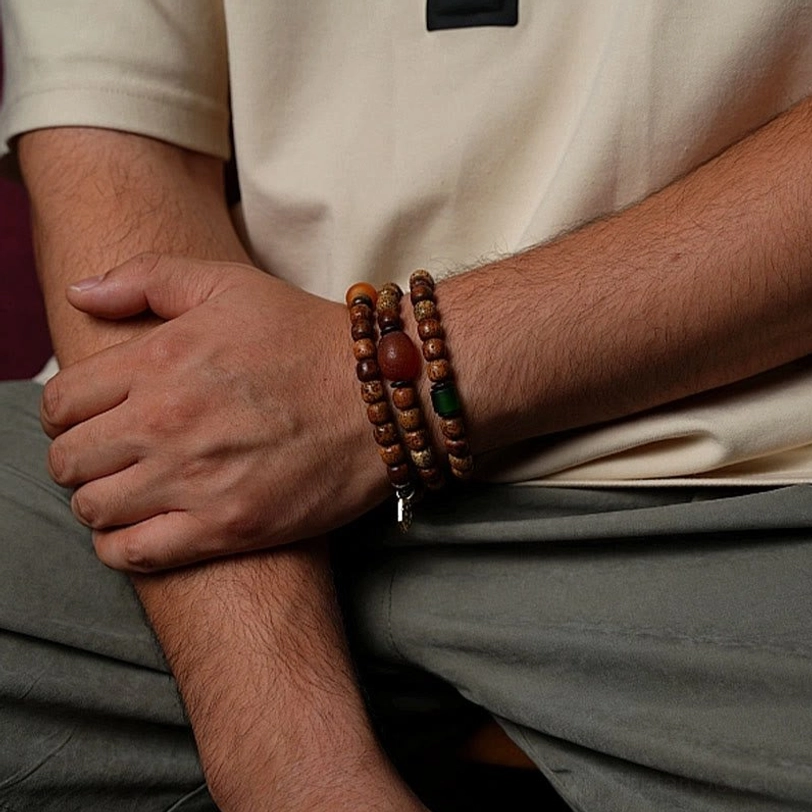 Triple wrap Tibetan mala bracelet featuring Zakiram Goddess protection symbolism with natural bodhi and dzi beads