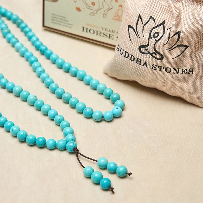 Complete turquoise mala meditation set including 108 beads, storage pouch with lotus design, and loose authentic turquoise stones