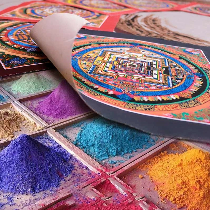 Unrolled Tibetan mandala thangka with vibrant artwork paired with natural mineral painting pigments