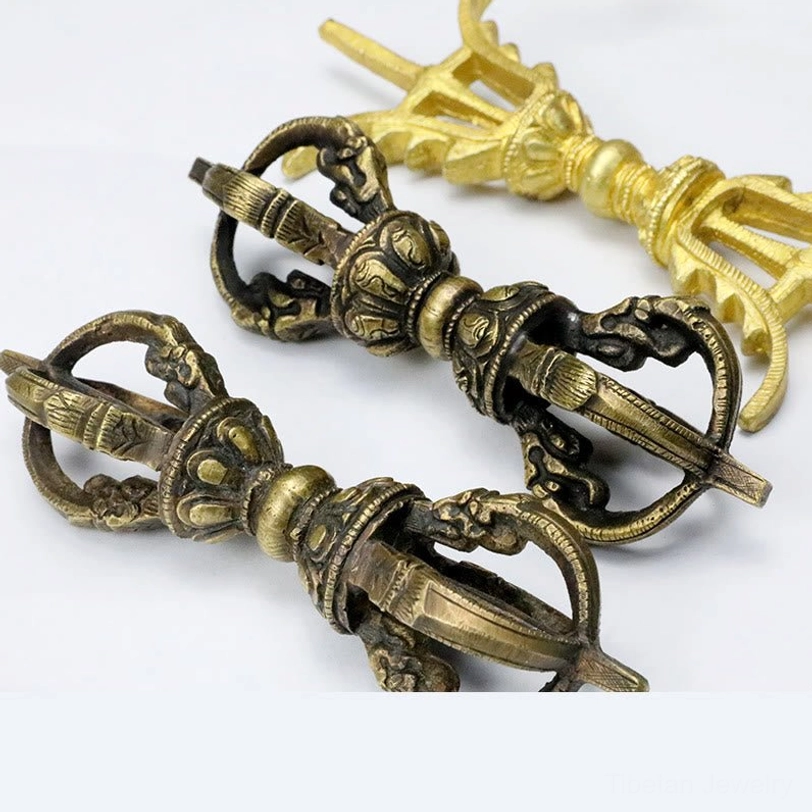 Tibetan Vajra Dorje copper ritual tool showing indestructible diamond and thunderbolt spiritual power symbolism