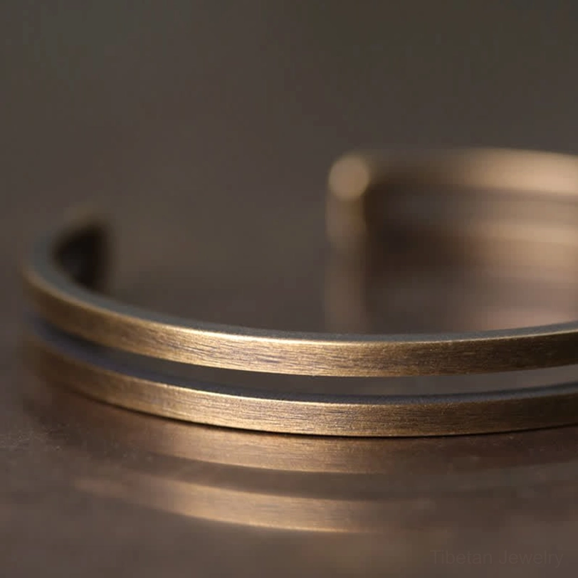 Viking cuff bracelet unisex design worn by multiple people showing versatile style appeal