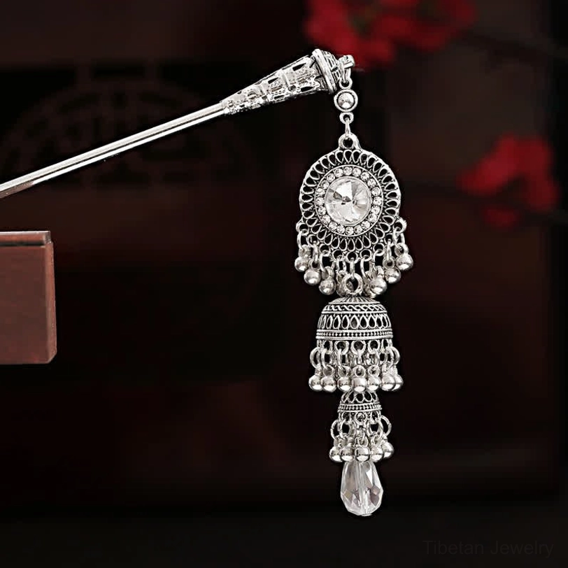 Vintage tassel hairpin right profile with filigree crystal pendant and layered bell tassel design
