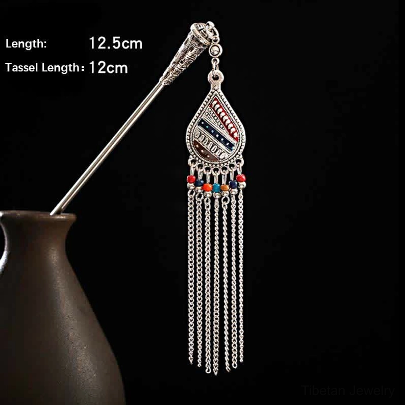 Vintage filigree crystal tassel hairpin close-up front view with layered bell tassels