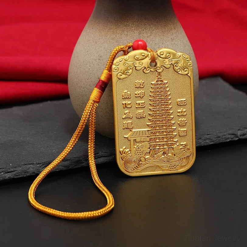 Wenchang feng shui charm detail shot - intricate embossed gold patterns and craftsmanship