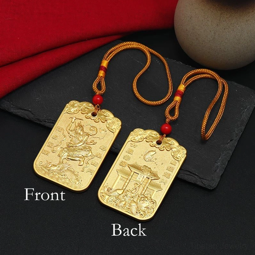 Pair of wenchang pagoda koi fish feng shui charms - front and back design comparison flat lay