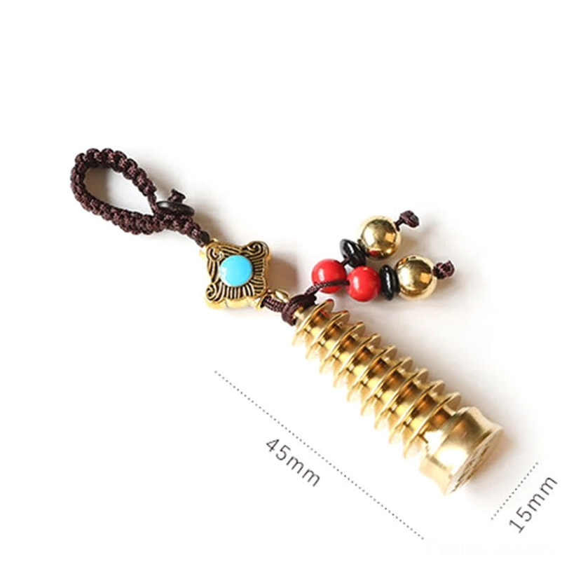 Extended Wenchang Pagoda brass keychain with threaded tower body and red bead ornaments, size reference showing scaled dimensions