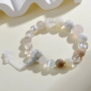 18-bead white agate pearl balance bracelet - flat lay product photography showing mixed natural stone beads and adjustable tassel clasp