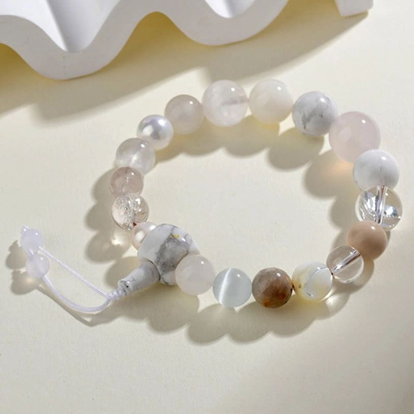 18-bead white agate pearl balance bracelet - flat lay product photography showing mixed natural stone beads and adjustable tassel clasp