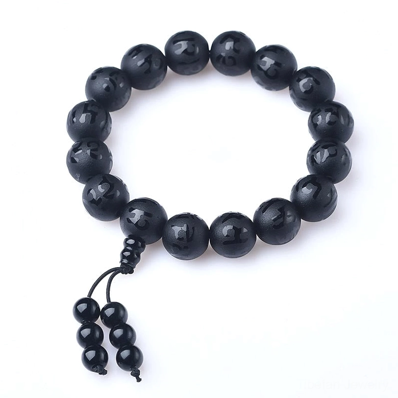 White crystal and black onyx meditation bracelets collection showing both variations side by side