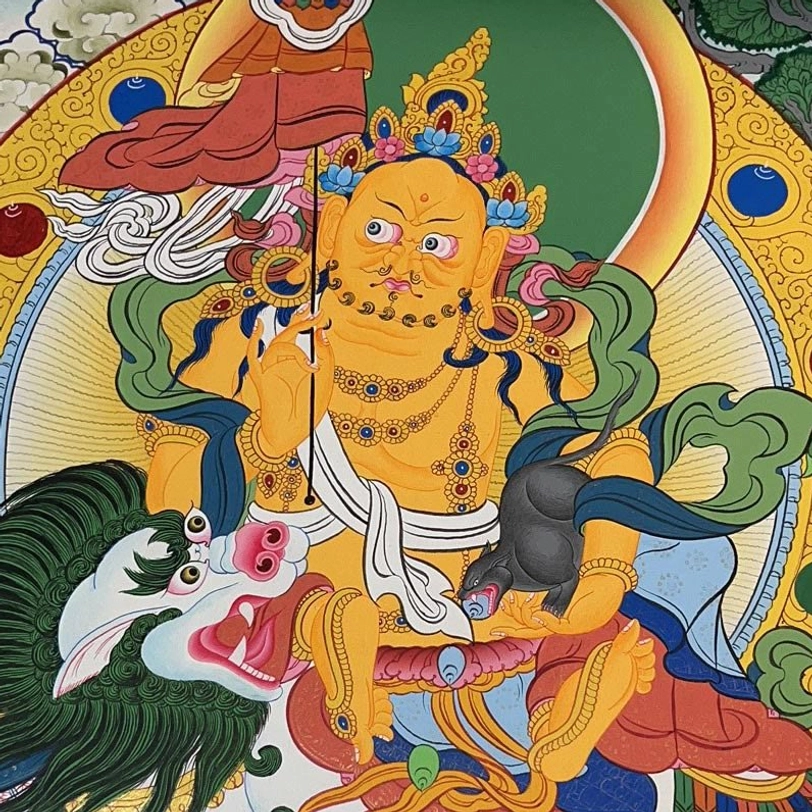 Yellow deity thangka with sacred umbrella and mongoose figure - prosperity and protection symbolism