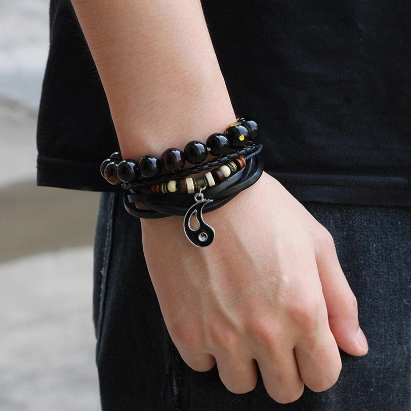 Yin yang symbol bracelet lifestyle shot showing spiritual balance and harmony meaning