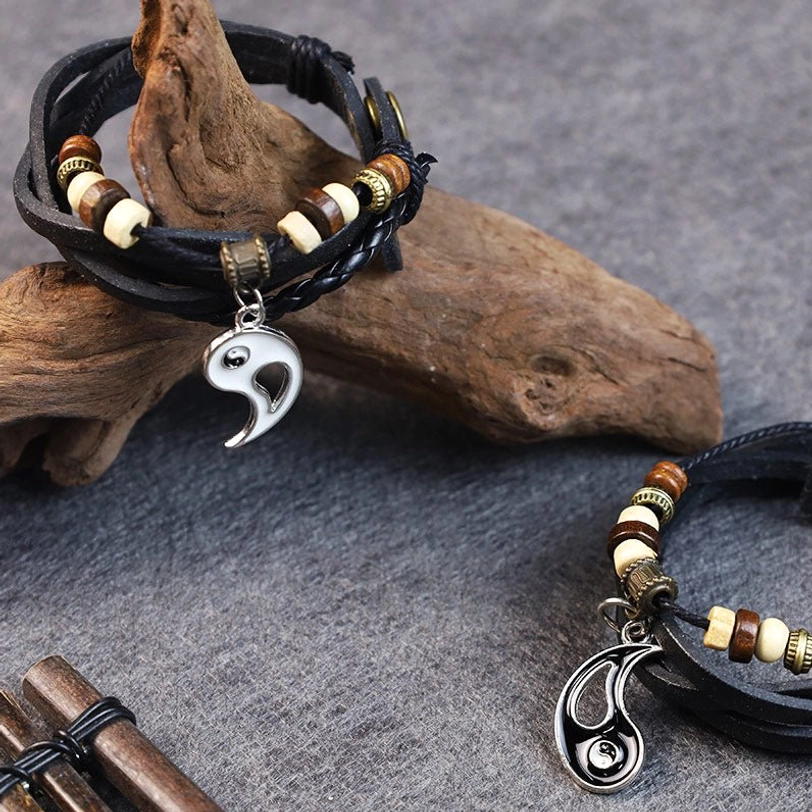 Black leather yin yang bracelet with partial charm and mixed wooden bead accents