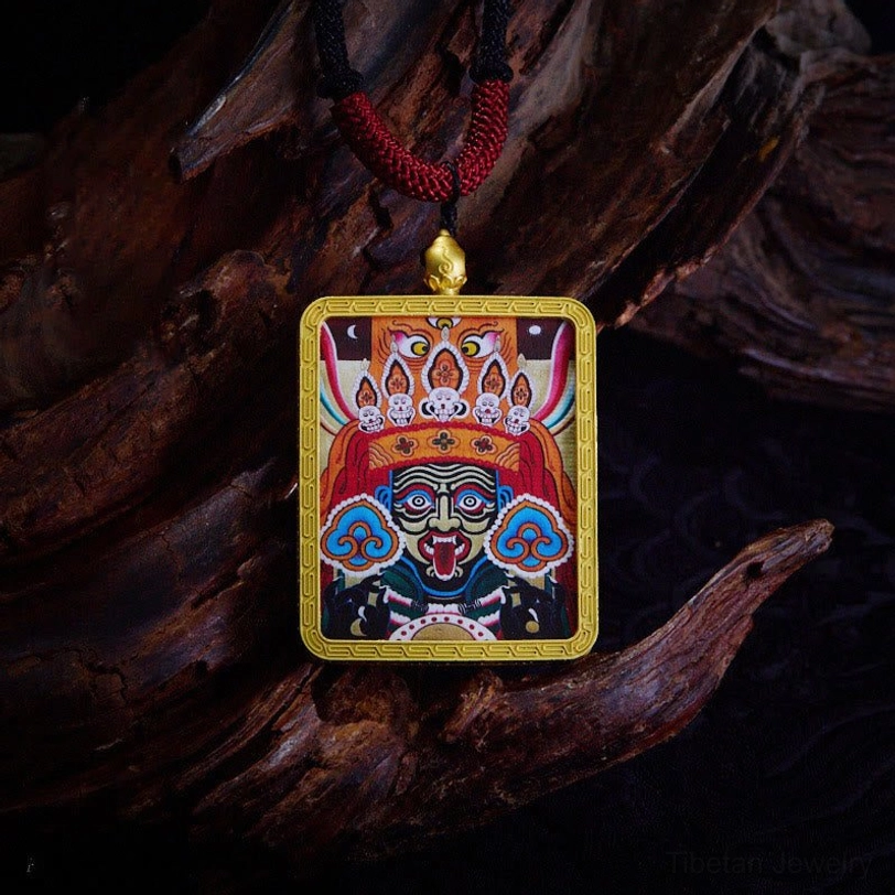 Orange Zakiram thangka pendant necklace with hand-painted orange wealth goddess design and traditional woven cord