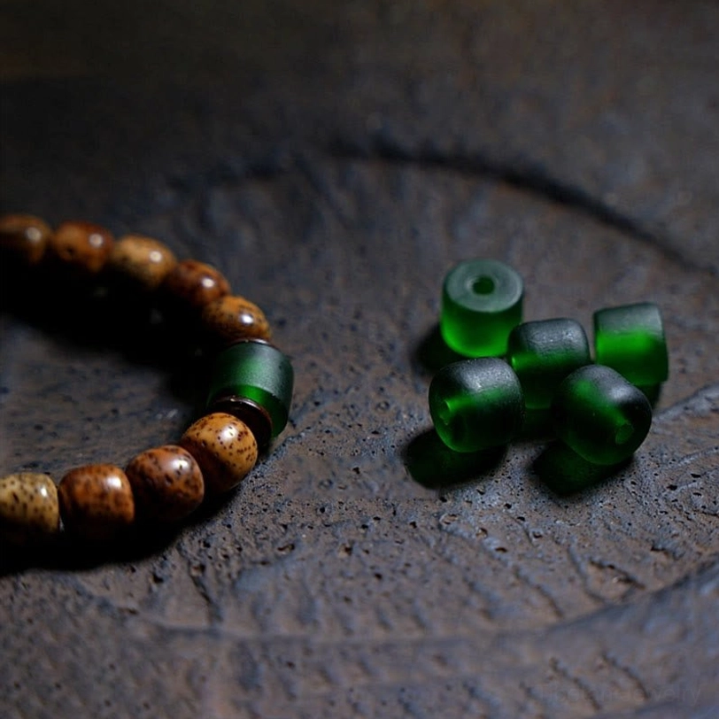 Zakiram Goddess of Wealth Tibetan bodhi seed bracelet with amber dzi beads in protective amulet arrangement