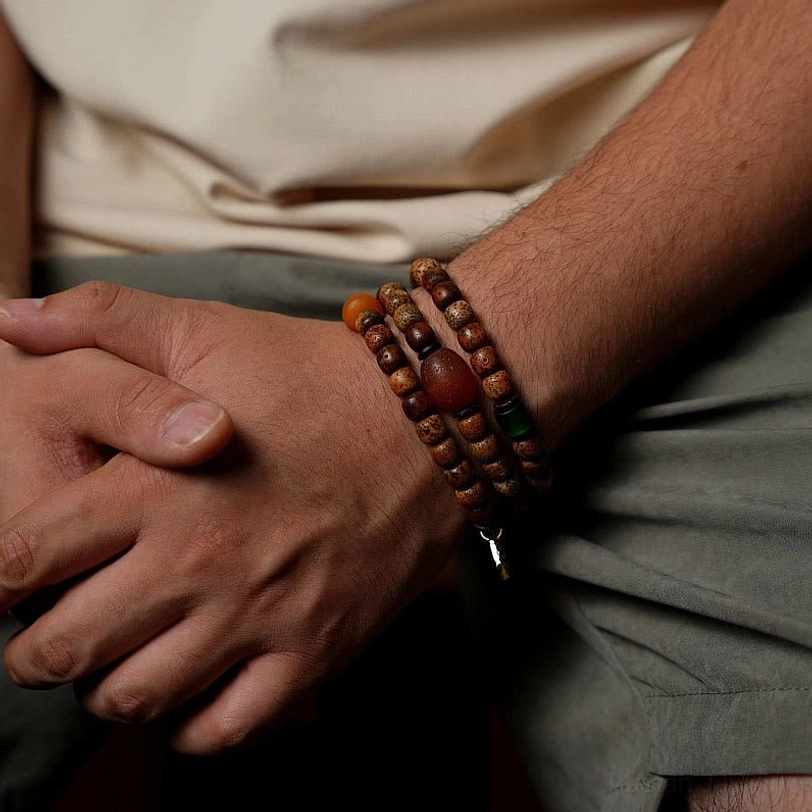 Sacred Zakiram Goddess Tibetan bracelet triple wrap design with protective bodhi, amber dzi, and agate beads