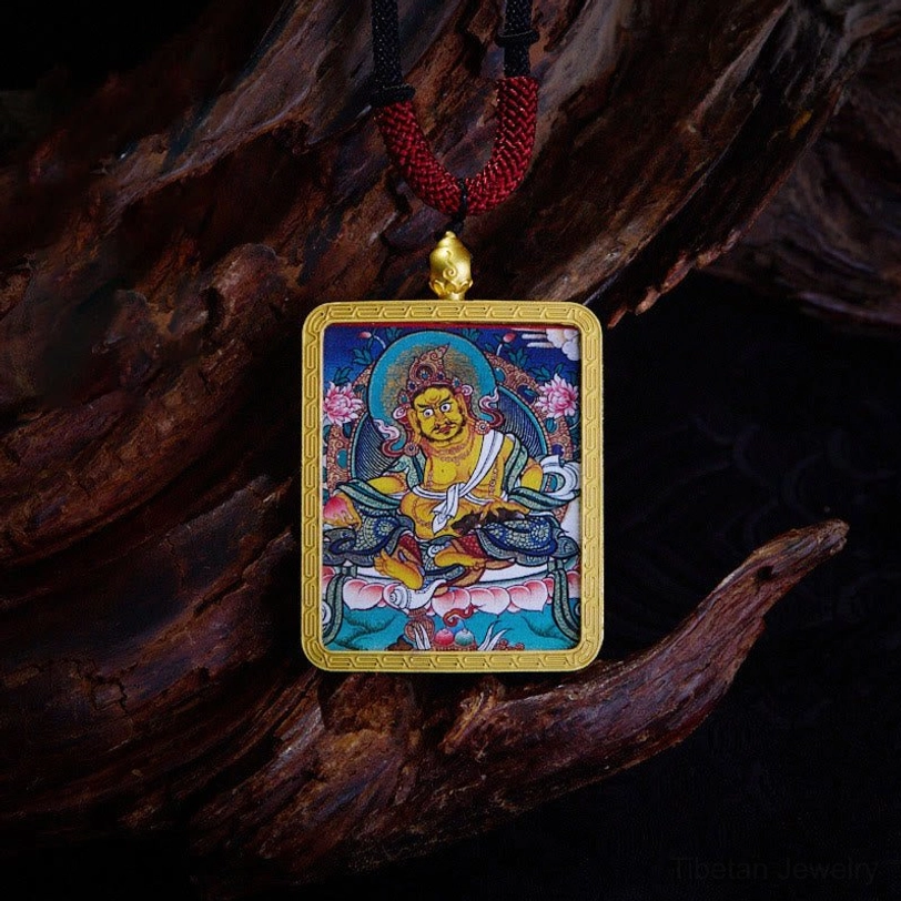 Yellow God of Wealth Zakiram thangka pendant necklace with hand-painted prosperity deity design and traditional woven red cord