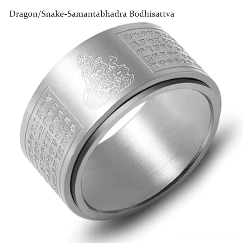 Titanium steel zodiac Buddha ring overhead flat lay showing complete engraved band and inner ring