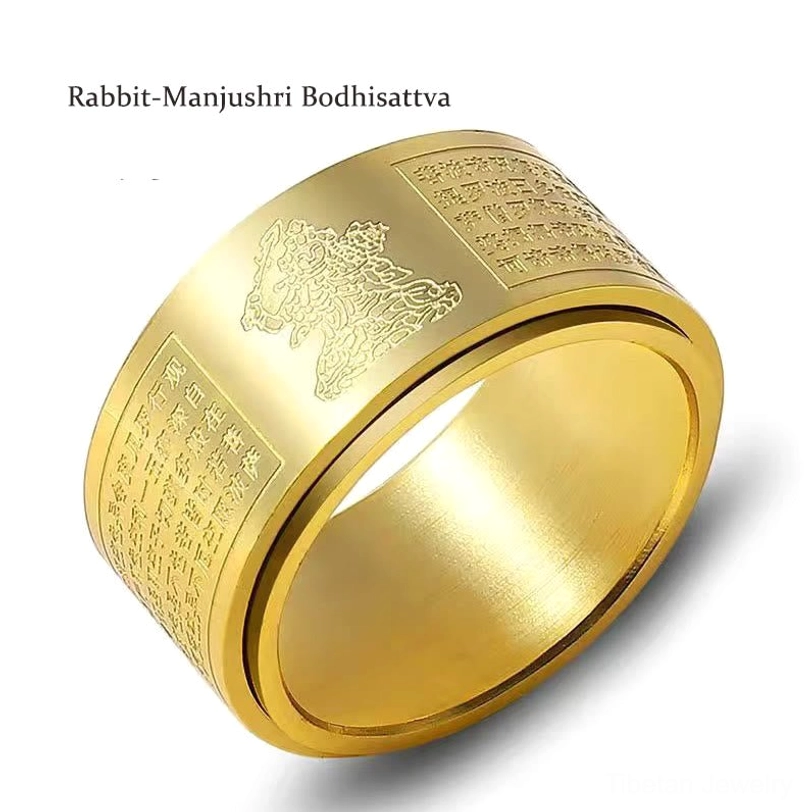 Chinese zodiac Natal Buddha spinning ring angled view showing rotating band and Buddhist deity carving